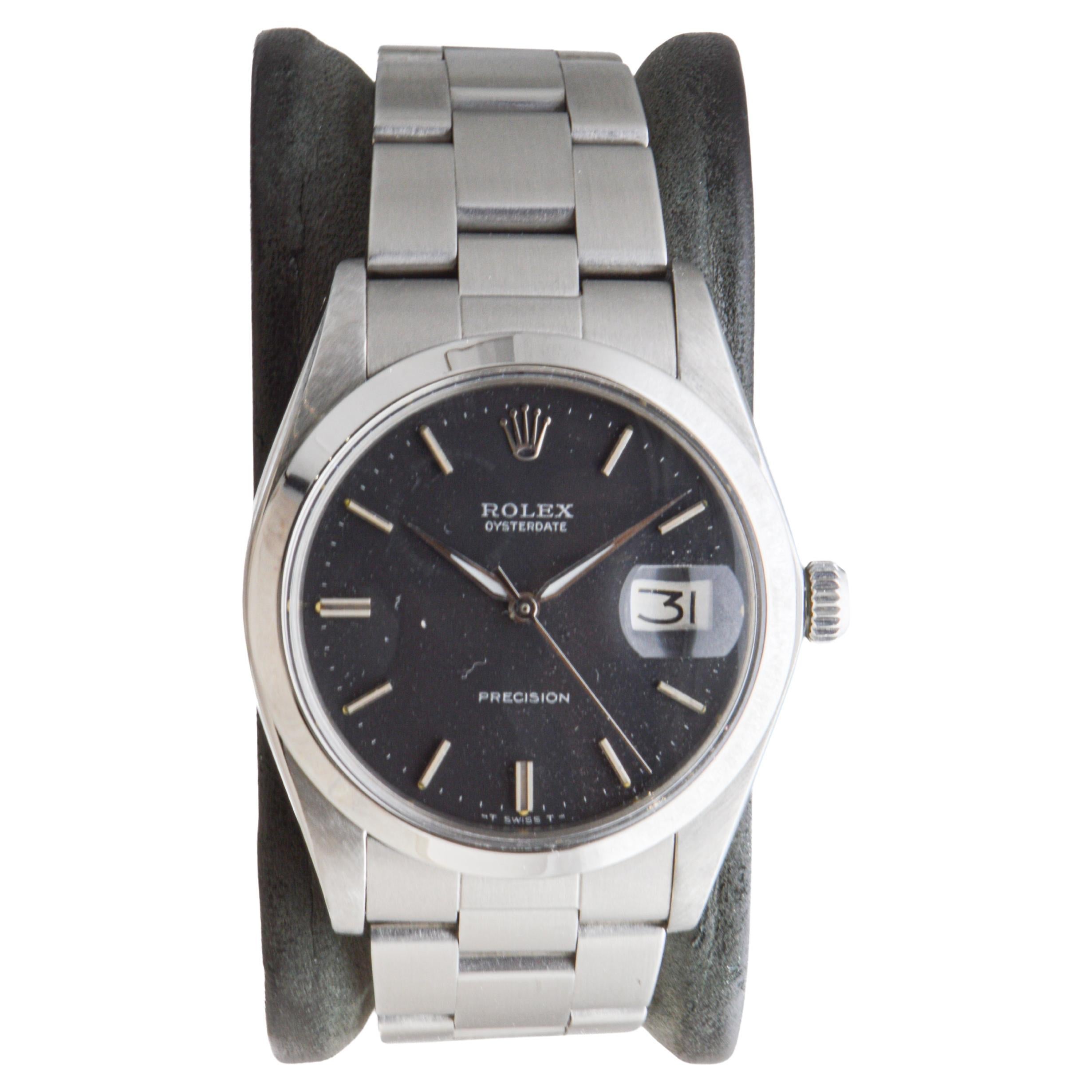 Rolex Stainless Steel Oysterdate with Factory Original Black Dial circa, 1970's In Excellent Condition For Sale In Long Beach, CA