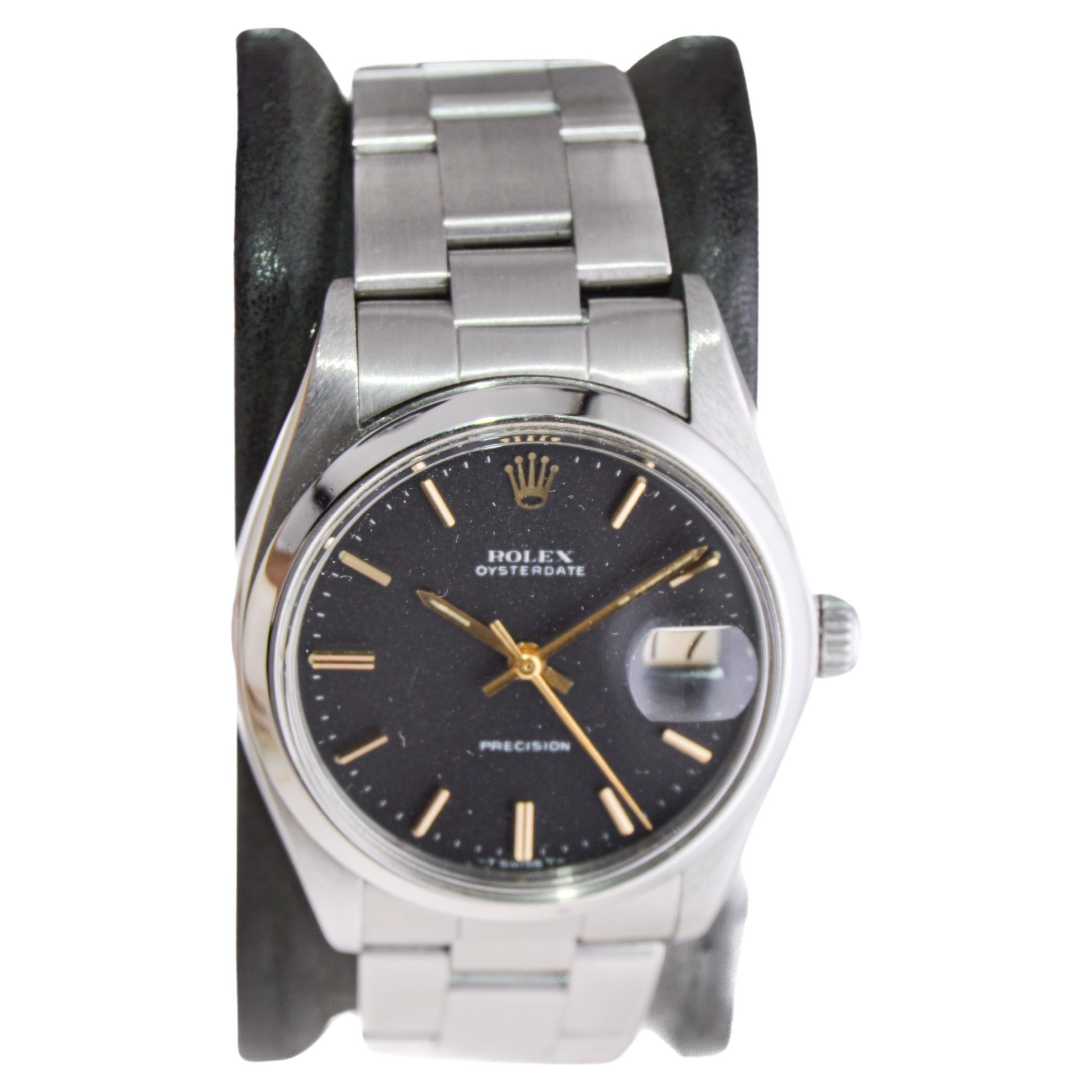 Modern Rolex Stainless Steel Oysterdate with Rare Factory Original Black Dial 1970's For Sale