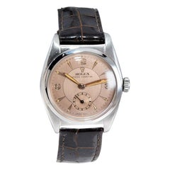 Montre Rolex Sub Seconds à dos bulle en acier inoxydable:: circa 1951