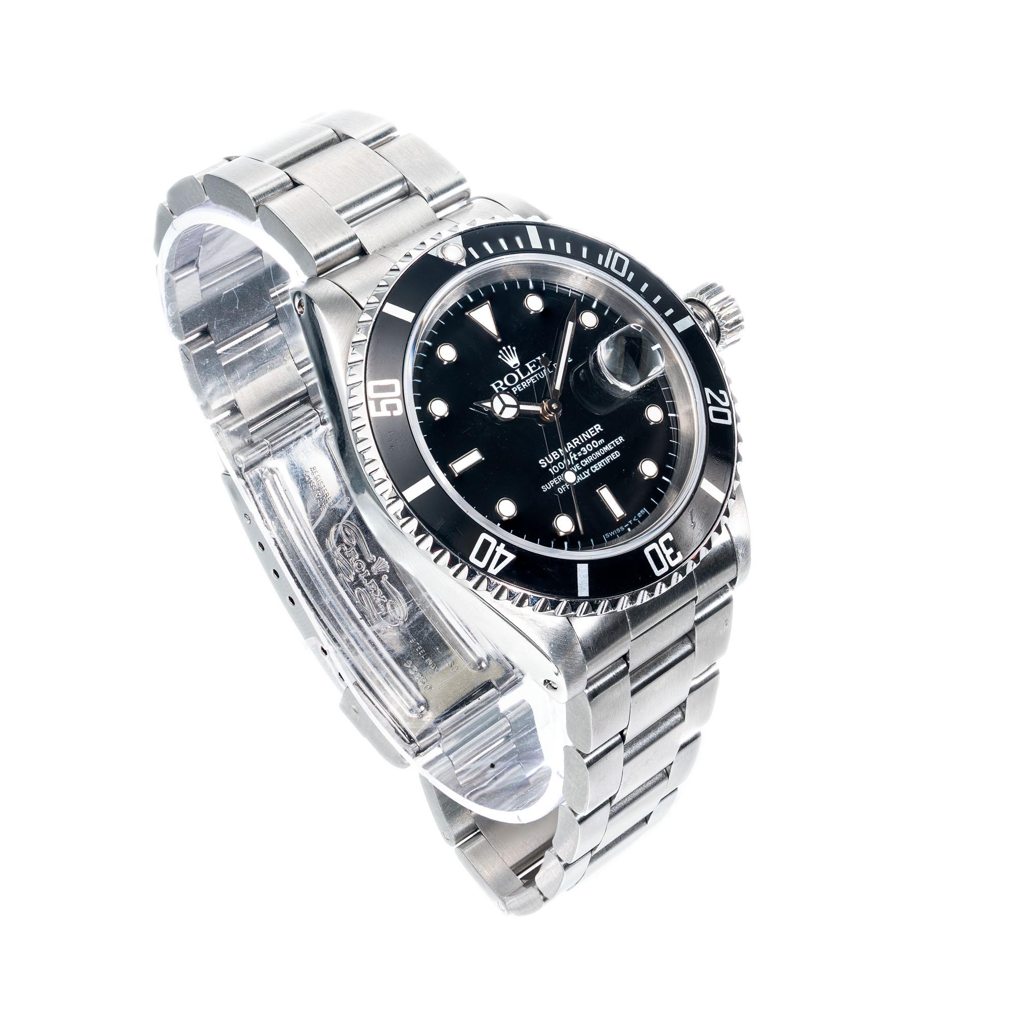 Men's Rolex submariner stainless steel, oyster band wristwatch.  model 16610 circa 1994.  

Length: 47.27mm
Width: 40mm
Band width at case: 20mm
Case thickness: 12.56mm
Crystal: sapphire
Dial: black
Other: Model 16610 Serial # 5180186
135.2
