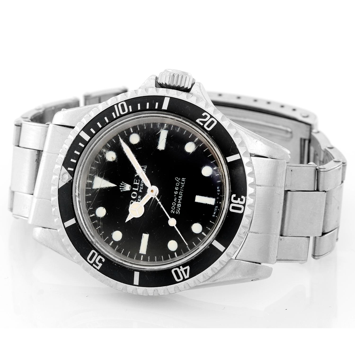 Rolex Submariner Men's Vintage Stainless Steel Watch 5513 - Automatic winding. Stainless steel case (40mm diameter). Black dial with luminous-style markers. Stainless steel Oyster bracelet. Pre-owned, Late-1960's model, ser 182****.
