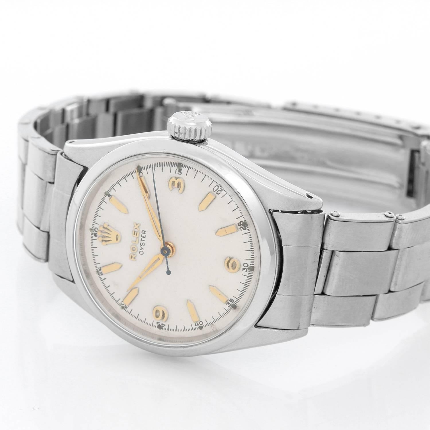 Vintage Rolex Oyster Royal Stainless Steel Ref 6444 -  Manual. Stainless steel ( 31 mm). White dial; gold markers with Explorer style 3-6-9 numerals.. Stainless steel oyster bracelet with deployant clasp. Pre-owned.