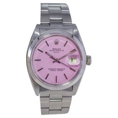 Rolex Montre Oyster Perpetual Date en acier avec cadran rose fait sur mesure, datant du milieu des années 1960