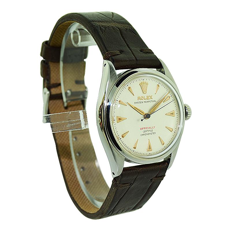 FACTORY / HOUSE: Rolex Watch Company
STYLE / REFERENCE: Oyster Perpetual Super Oyster / 6084
METAL / MATERIAL: Stainless Steel 
CIRCA / YEAR: 1951 / 1952
DIMENSIONS / SIZE: 40mm X 34mm
MOVEMENT / CALIBER: Perpetual Winding / 18 Jewels / Cal.