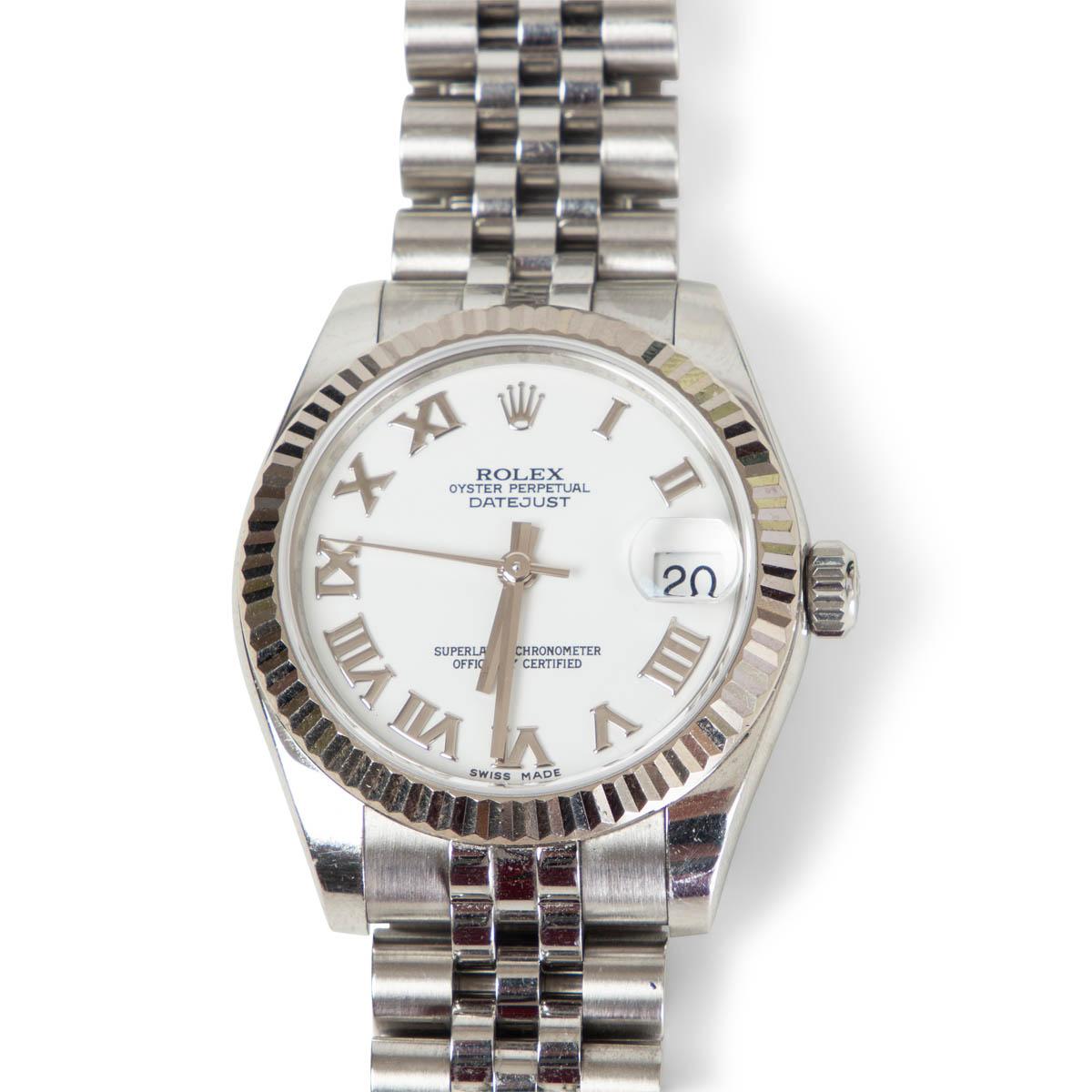 100% authentic Rolex Oyster Perpetual Datejust 31 watch reference number 178274. Jubulee bracelet in steel, fluted bezel in white gold, white dial and case diameter of 31mm. Opens with a fold clasp in steel. Sapphire crystal glass. 10AM water