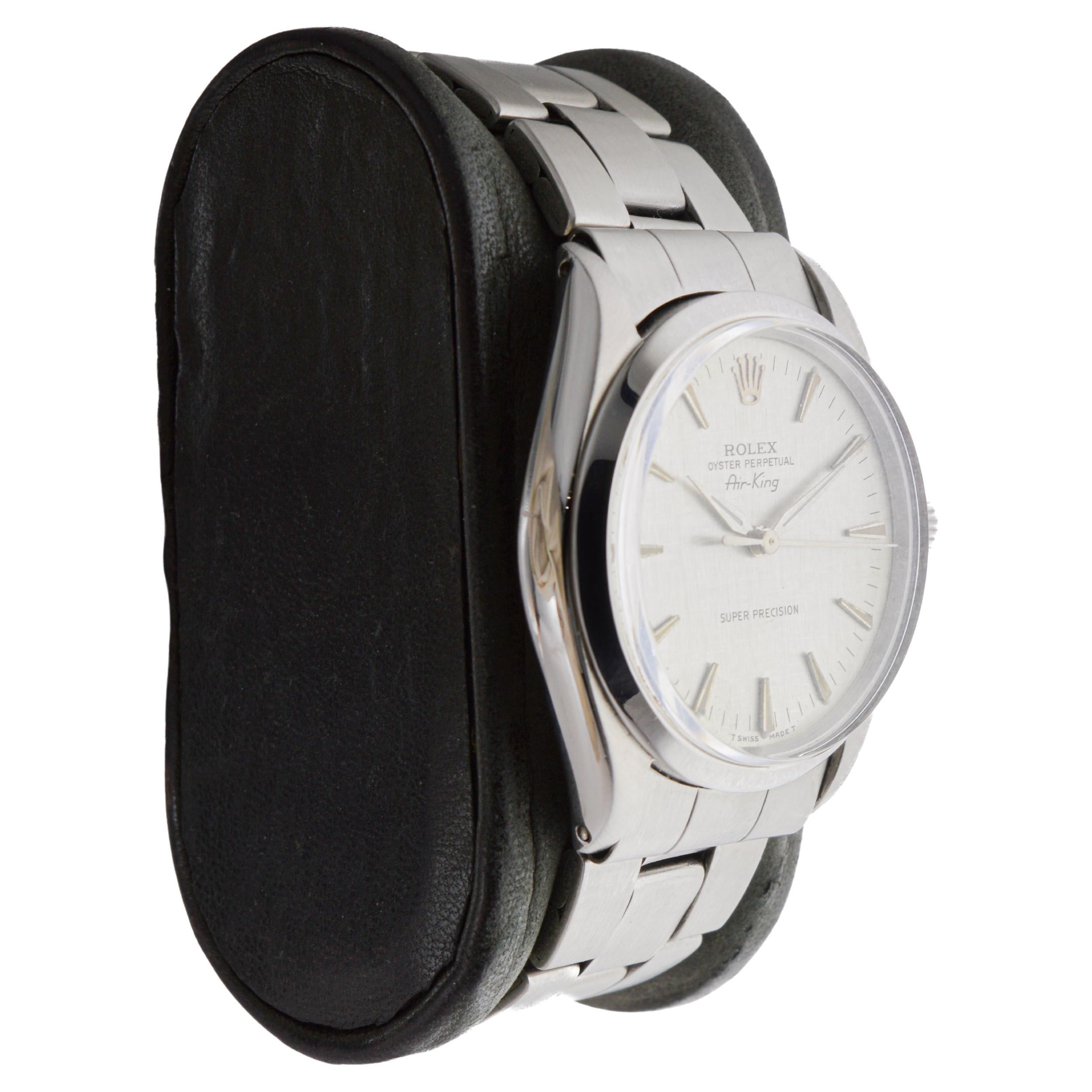 FACTORY / HOUSE: Rolex Watch Company
STYLE / REFERENCE: Air King / Reference 5500-1002
METAL / MATERIAL: Stainless Steel
CIRCA / YEAR: 1964
DIMENSIONS / SIZE: Length 39mm X Diameter 35mm
MOVEMENT / CALIBER: Perpetual Winding / 26 Jewels / Caliber