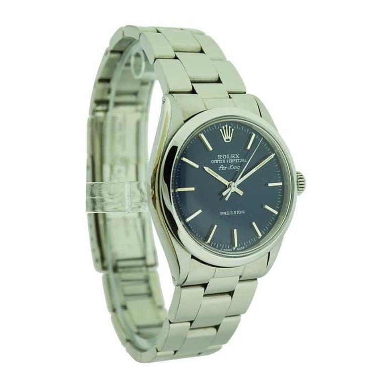 FACTORY / HOUSE: Rolex Watch Company 
STYLE / REFERENCE: Air King / Ref. 5500
METAL / MATERIAL: Stainless Steel  
CIRCA / YEAR: 1968 / 1969
DIMENSIONS / SIZE: 40mm X 34mm
MOVEMENT / CALIBER: Perpetual Winding / 26 Jewels 
DIAL / HANDS: Custom Blue