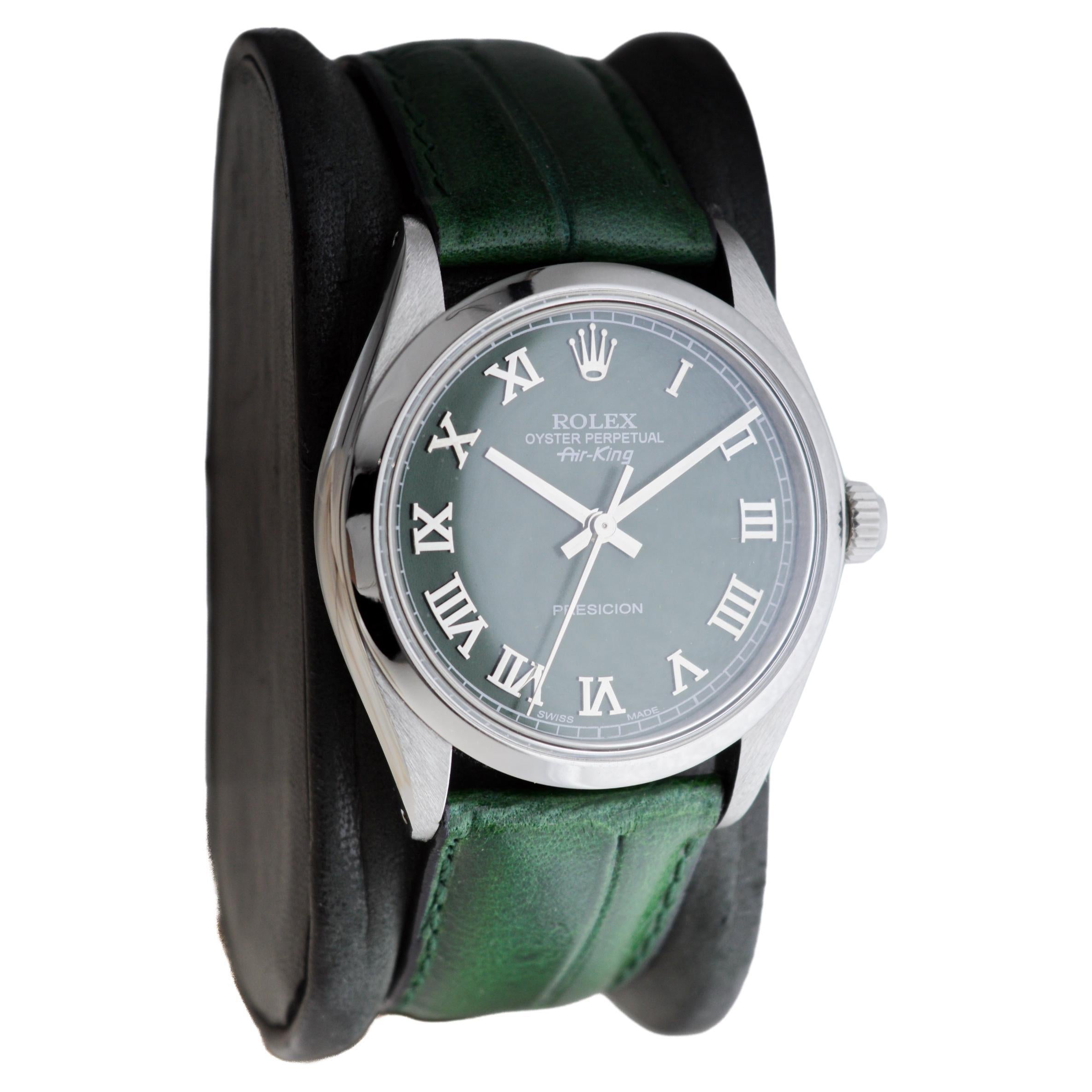 rolex dark green dial