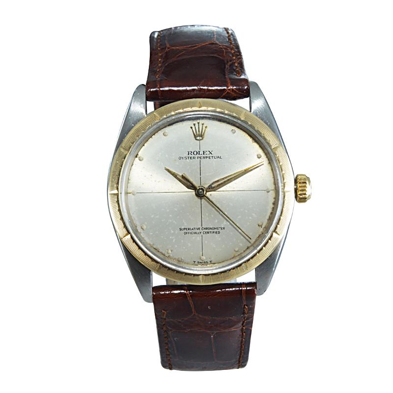 FACTORY / HOUSE: Rolex Watch Company
STYLE / REFERENCE: Two Tone / Ref. 1008
METAL / MATERIAL: Stainless Steel and 14kt. Solid Gold 
CIRCA / YEAR: 1967-68
DIMENSIONS / SIZE: 39mm X 34mm
MOVEMENT / CALIBER: Perpetual Winding / 26 Jewels 
DIAL /