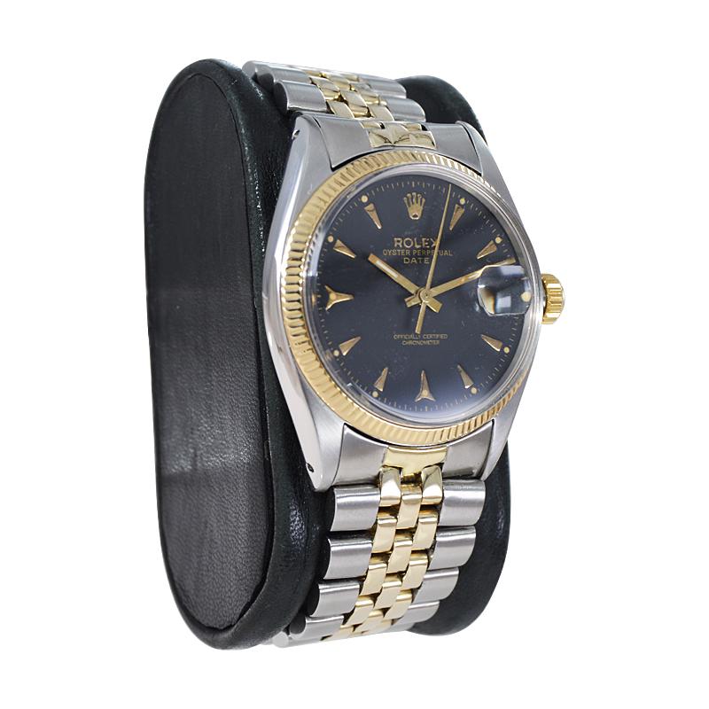Modern Rolex Steel and 14Kt. Oyster Perpetual Date with Original Bracelet. circa 1950s For Sale