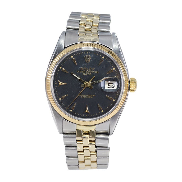 Rolex Steel and 14Kt. Oyster Perpetual Date with Original Bracelet. circa 1950s For Sale