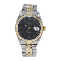 Used Rolex Steel and 14Kt. Oyster Perpetual Date with Original Bracelet. circa 1950s