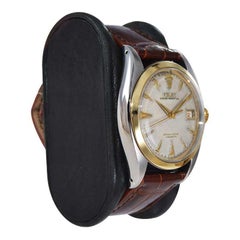 Rolex Montre Perpetual en acier et or de 1952 avec cadran, aiguilles et couronne d'origine