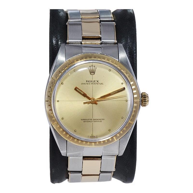 FACTORY / HOUSE: Rolex Watch Company
STYLE / REFERENCE: Zephyr Oyster Perpetual / Reference 1038
METAL / MATERIAL: Stainless Steel and 14Kt. Yellow Gold 
CIRCA / YEAR: 1969 / 70's
DIMENSIONS / SIZE: Length 41mm X Diameter 34mm
MOVEMENT / CALIBER: