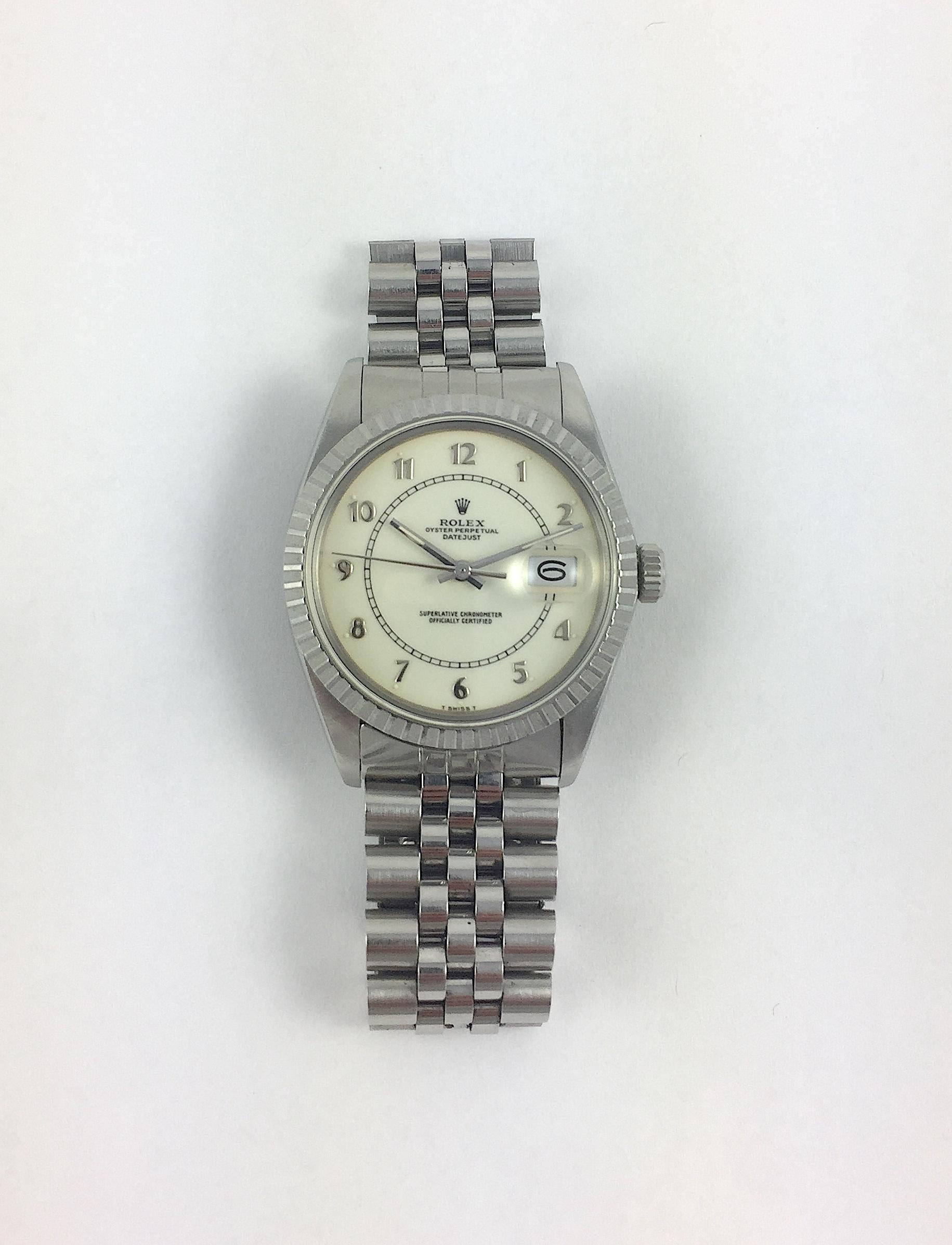 Rolex Stainless Steel and White Gold Oyster Perpetual Datejust Watch
Extremely Rare Eggshell Enamel Boiler Gauge Dial with Arabic Numerals
White Gold Gold Fluted Bezel
Stainless Steel Case
36mm in size 
Features Rolex Automatic Movement with Calibre