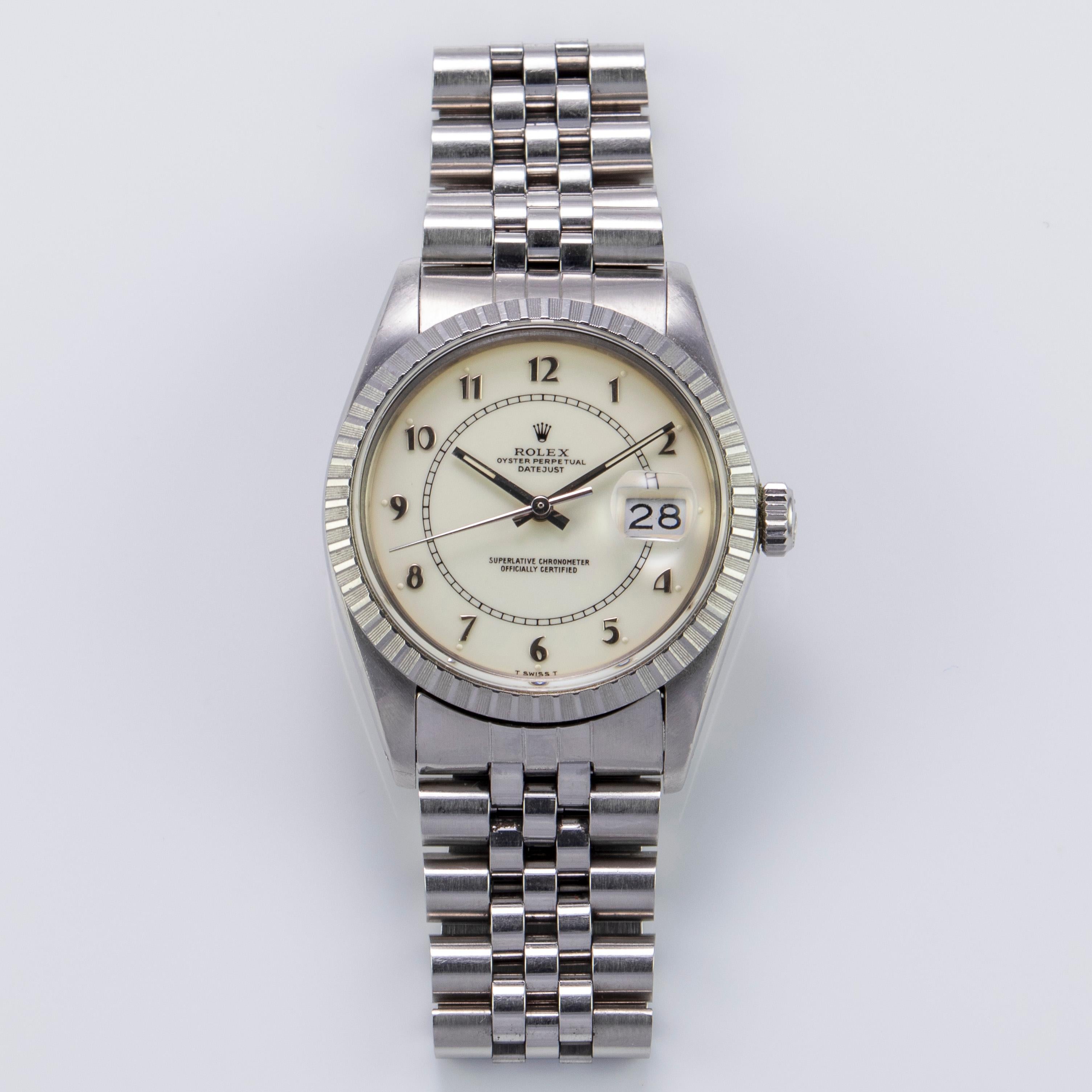 Rolex Stainless Steel and White Gold Oyster Perpetual Datejust Watch
Extremely Rare Eggshell Enamel Boiler Gauge Dial with Arabic Numerals
White Gold Gold Fluted Bezel
Stainless Steel Case
36mm in size 
Features Rolex Automatic Movement with Calibre