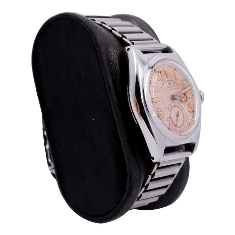 FACTORY / HOUSE: Rolex Watch Company
STYLE / REFERENCE: Oyster Perpetual / Reference 2764
METAL / MATERIAL: Stainless Steel
CIRCA / YEAR: 1940's
DIMENSIONS / SIZE: Length 32mm X Diameter 38mm
MOVEMENT / CALIBER: Perceptual Winding / 17 Jewels /