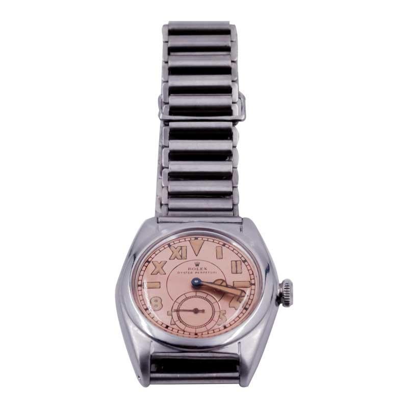 Rolex Steel Bubble Back with Romabic Dial 1940's with Original Ladder Bracelet In Excellent Condition In Long Beach, CA