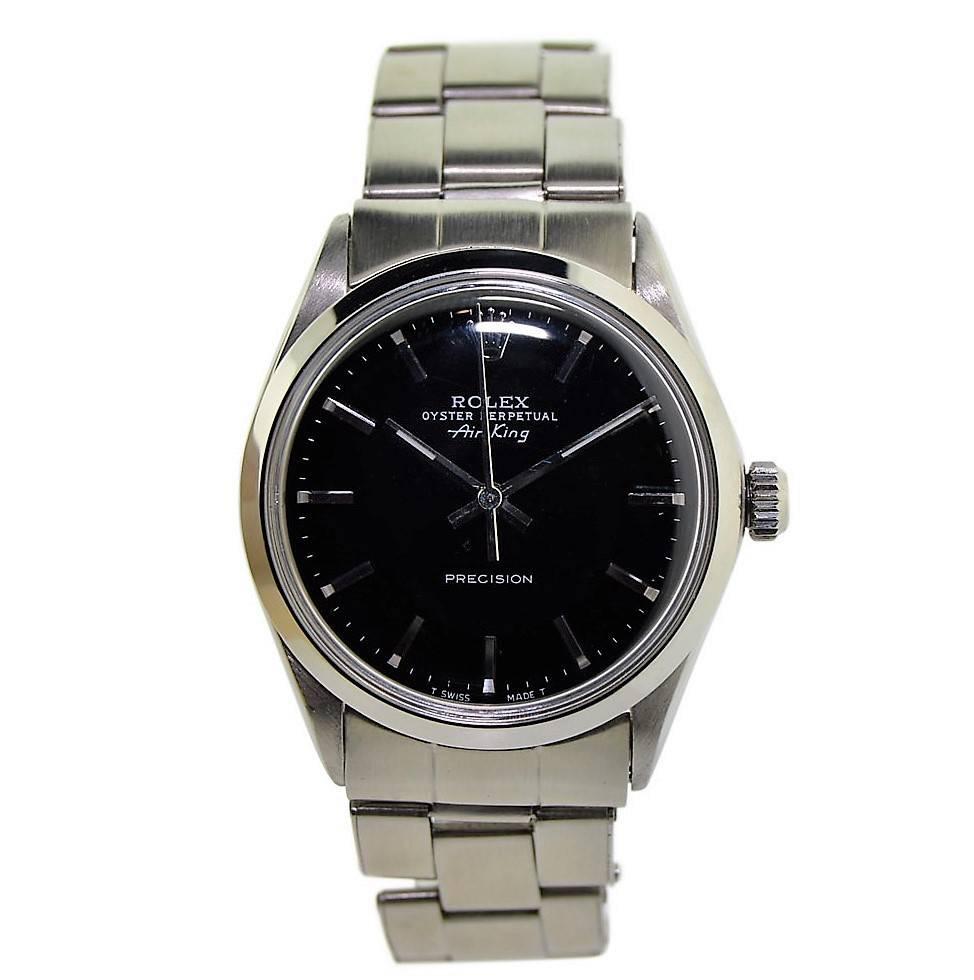 FACTORY / HOUSE: Rolex Watch Company
STYLE / REFERENCE: Air King / Ref. 5500
METAL / MATERIAL: Stainless Steel
CIRCA: 1968 / 1969
DIMENSIONS: 39mm X 35mm
MOVEMENT / CALIBER: Perpetual Winding / 26 Jewels / Cal. 1520
DIAL / HANDS: Original Black Dial