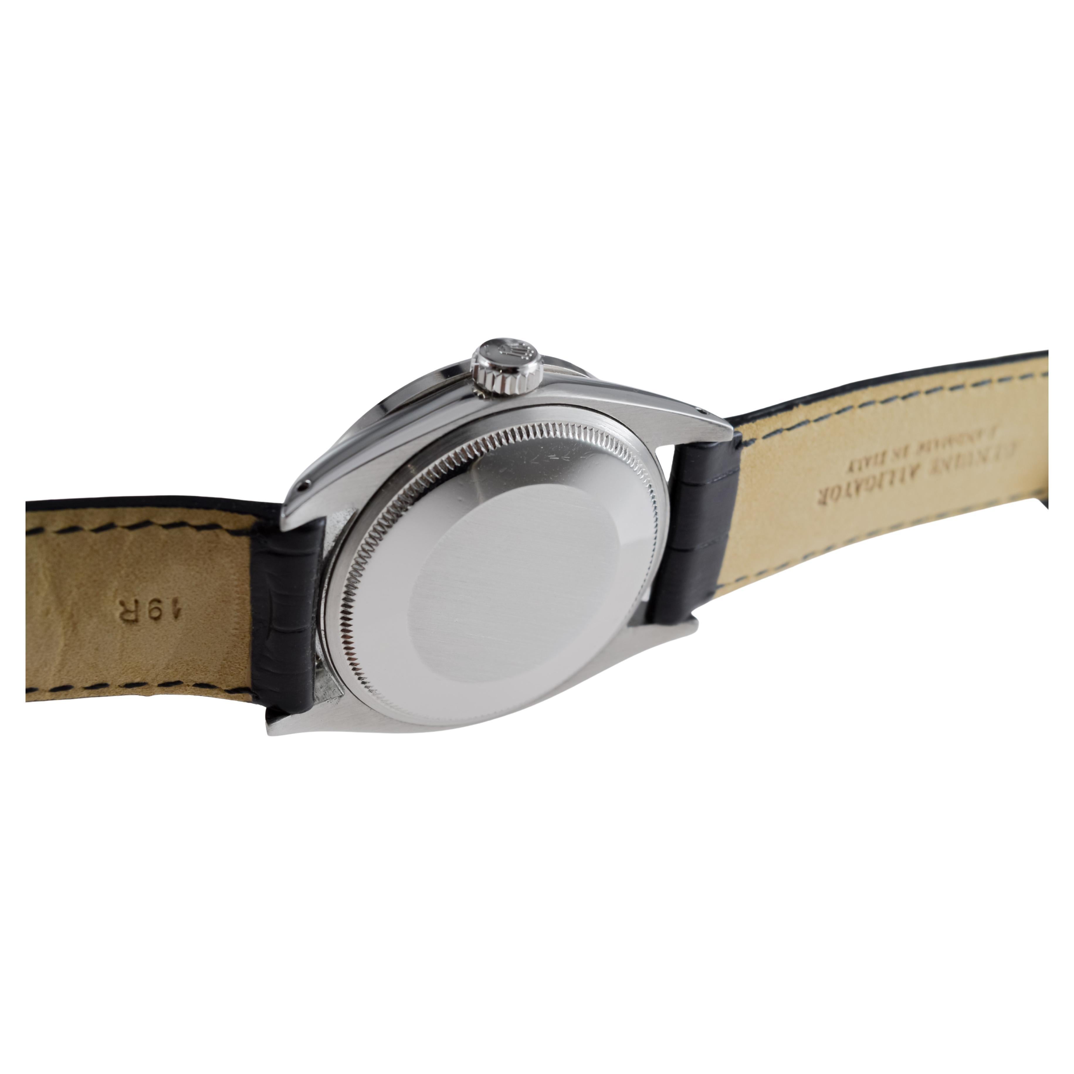 Rolex modello data in acciaio con raro quadrante nero, anni '60 circa, con ghiera personalizzata in vendita 11