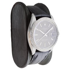 Rolex Steel Date Model with Rare Black Dial circa, 1960's with Custom Made Bezel