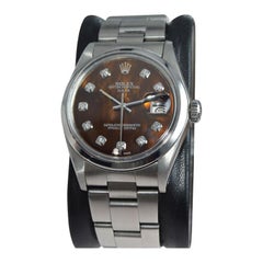 Rolex Steel Oyster Perpetual Date with Custom Mother of Pearl Diamond Dial 1960s