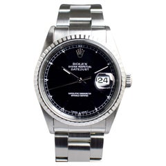 Rolex Stahl Datejust Uhr mit schwarzem Zifferblatt 16220 aus Stahl mit Papier, 1997