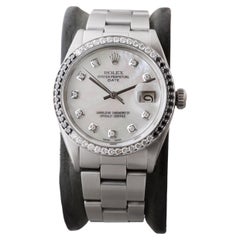 Rolex Montre O.P Date en acier avec cadran M.O.P fait sur mesure et lunette en diamants, circa 1970