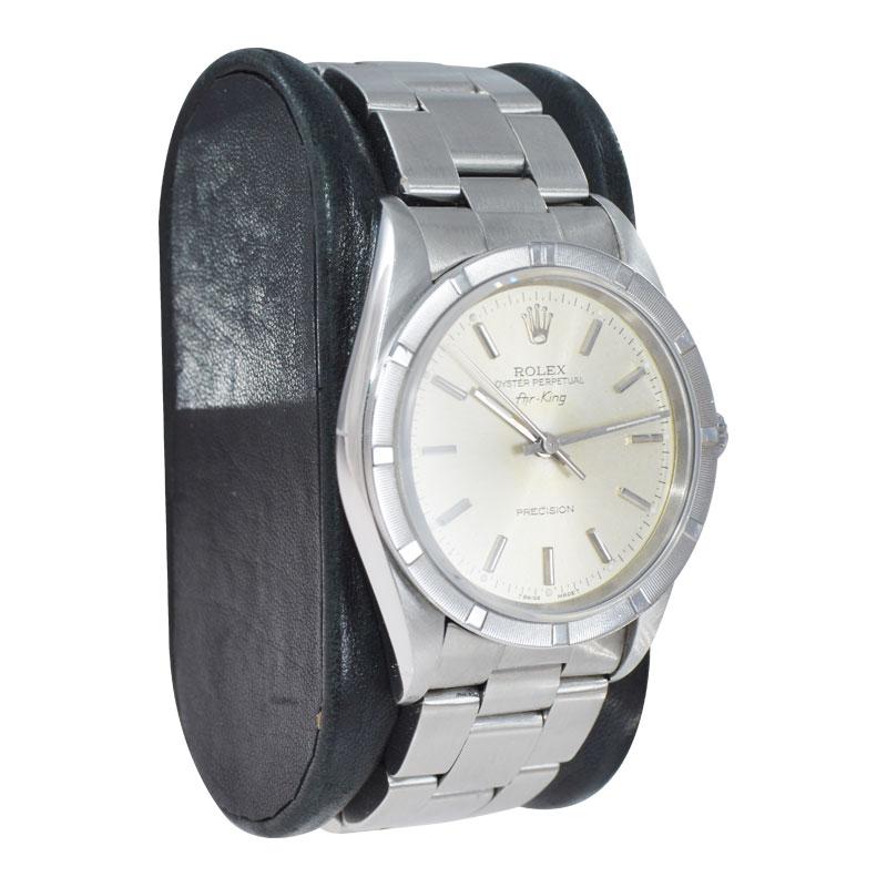 FACTORY / HOUSE: Rolex Watch Company
STYLE / REFERENCE: Air King 
METAL / MATERIAL: Stainless Steel 
CIRCA / YEAR: 1996
DIMENSIONS / SIZE: Length 42mm X Diameter 34mm
MOVEMENT / CALIBER: Perpetual Winding / 26 Jewels 
DIAL / HANDS: Original Silvered