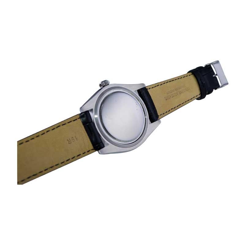Rolex Steel Oysterdate with Rare Factory Black Dial and Gilt Numbers, 1970's 10