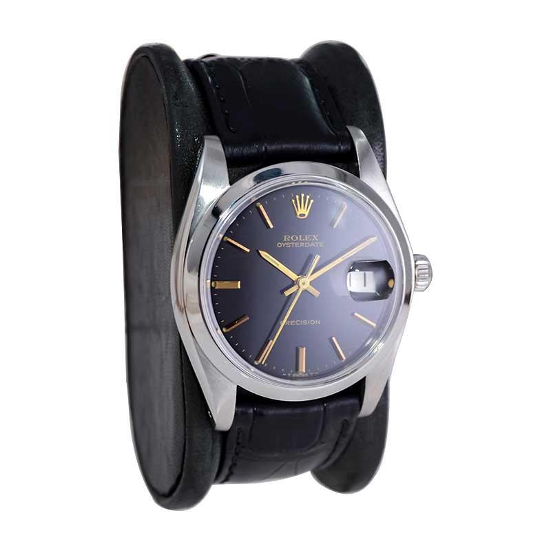 Modern Rolex Steel Oysterdate with Rare Factory Black Dial and Gilt Numbers, 1970's