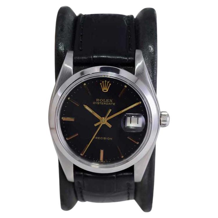 Rolex Steel Oysterdate with Rare Factory Black Dial and Gilt Numbers, 1978 or 79 For Sale