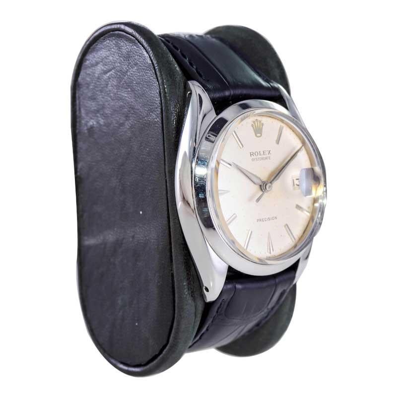 FACTORY / HOUSE: Rolex Watch Company
STYLE / REFERENCE: Oysterdate / Reference 6694
METAL / MATERIAL: Stainless Steel
CIRCA / YEAR: 1960's
DIMENSIONS / SIZE: Length 42mm X Diameter 35mm
MOVEMENT / CALIBER: Manual Winding / 17 Jewels 
DIAL / HANDS: