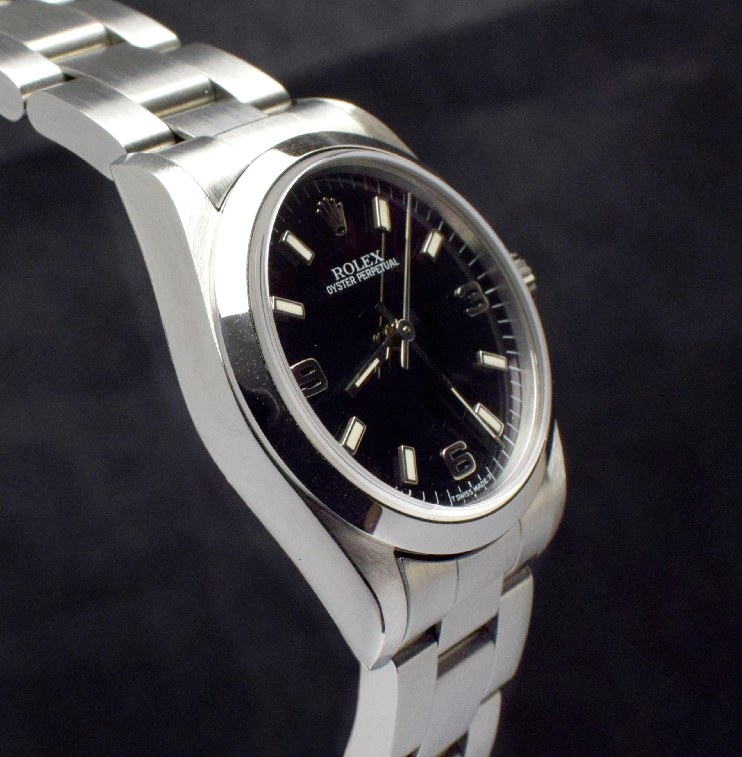 Women's or Men's Rolex Steel Oyster Perpetual Black 3 6 9 Dial 67480 , 1998