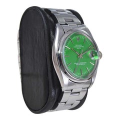 Rolex Montre Oyster Perpetual Date en acier avec cadran vert personnalisé, années 60 / 70