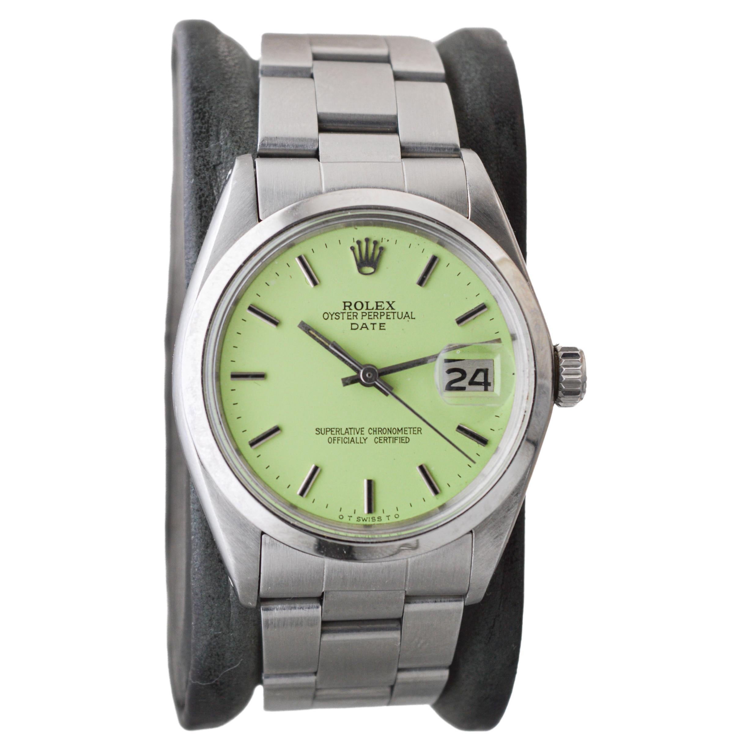 Modern Rolex Steel Oyster Perpetual Date With Custom Made Light Green Dial circa 1970's For Sale