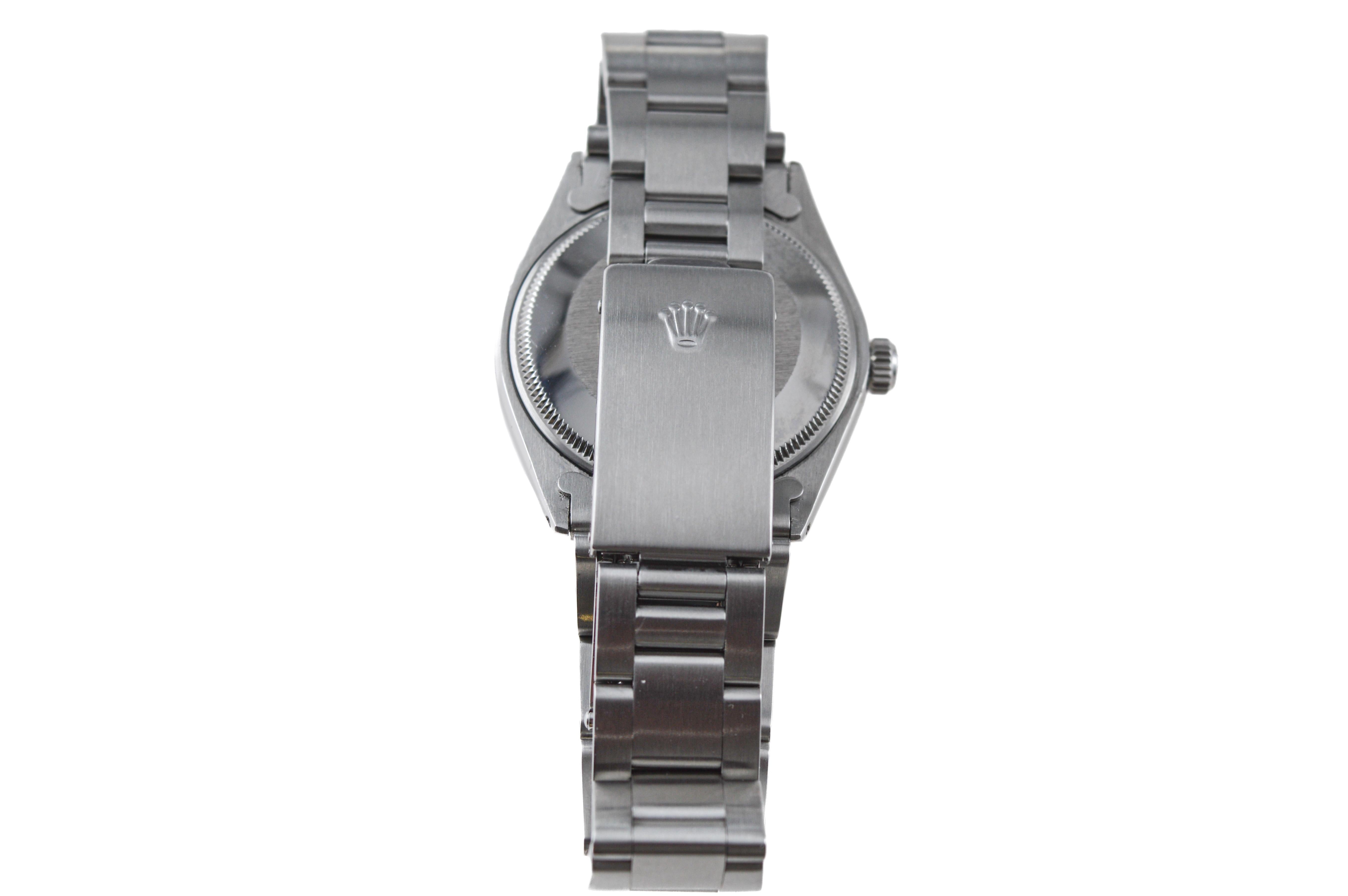 Women's or Men's Rolex Steel Oyster Perpetual Date With Custom Made Light Green Dial circa 1970's For Sale