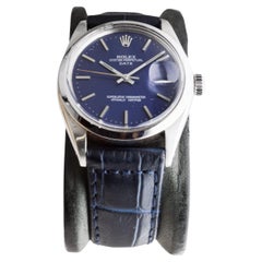 Rolex Oyster Perpetual Date de acero con esfera azul marino hecha a medida circa, años 70