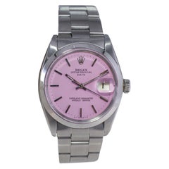 Rolex Oyster Perpetual Date de acero con esfera rosa hecha a medida circa años 70