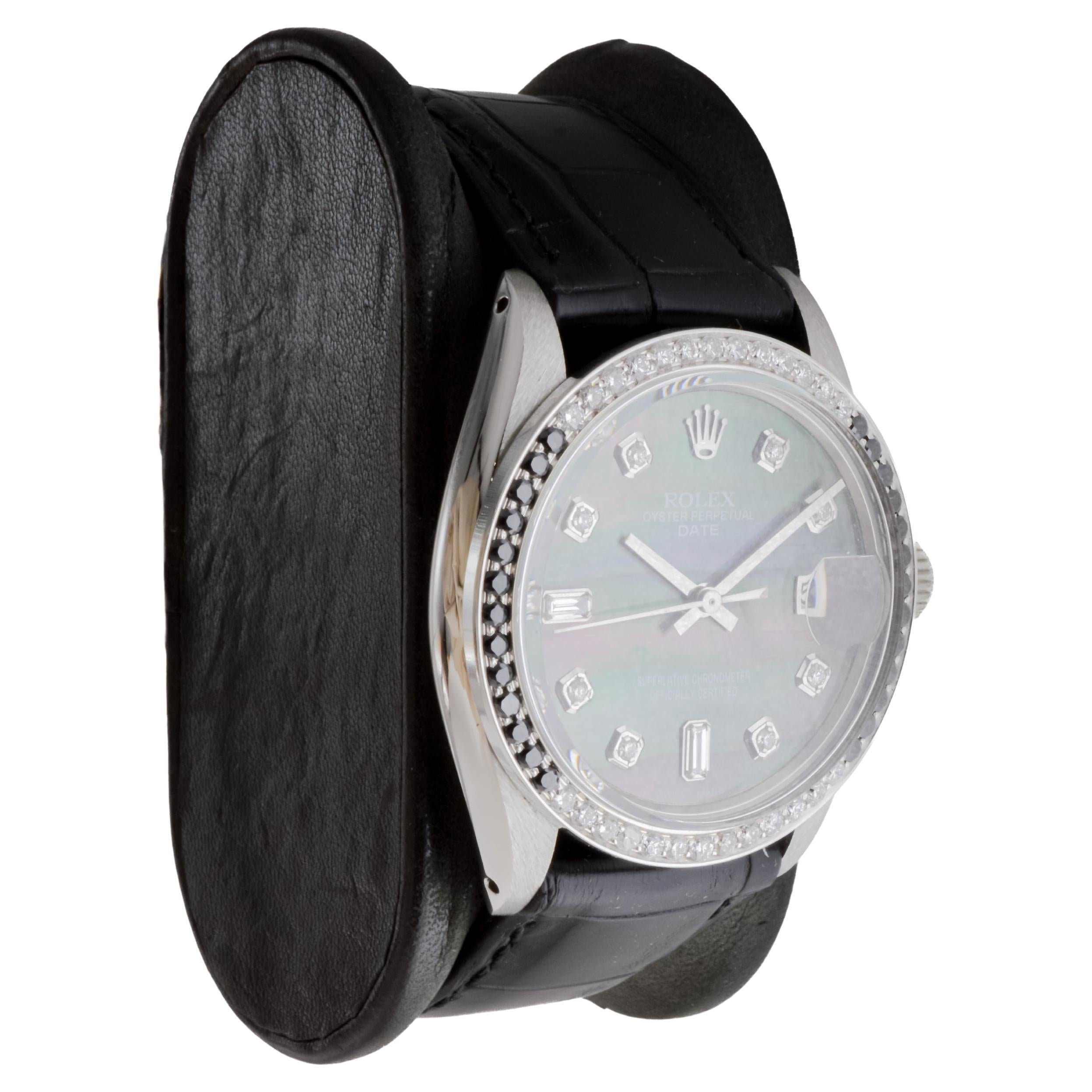 FACTORY / HOUSE: Rolex Watch Company
STYLE / REFERENCE: Oyster Perpetual Date / Reference 1500
METAL / MATERIAL: Stainless Steel with Custom Bezel Black and White Diamonds
CIRCA / YEAR: 1970's
DIMENSIONS / SIZE: Length 41mm X Diameter 36mm
MOVEMENT
