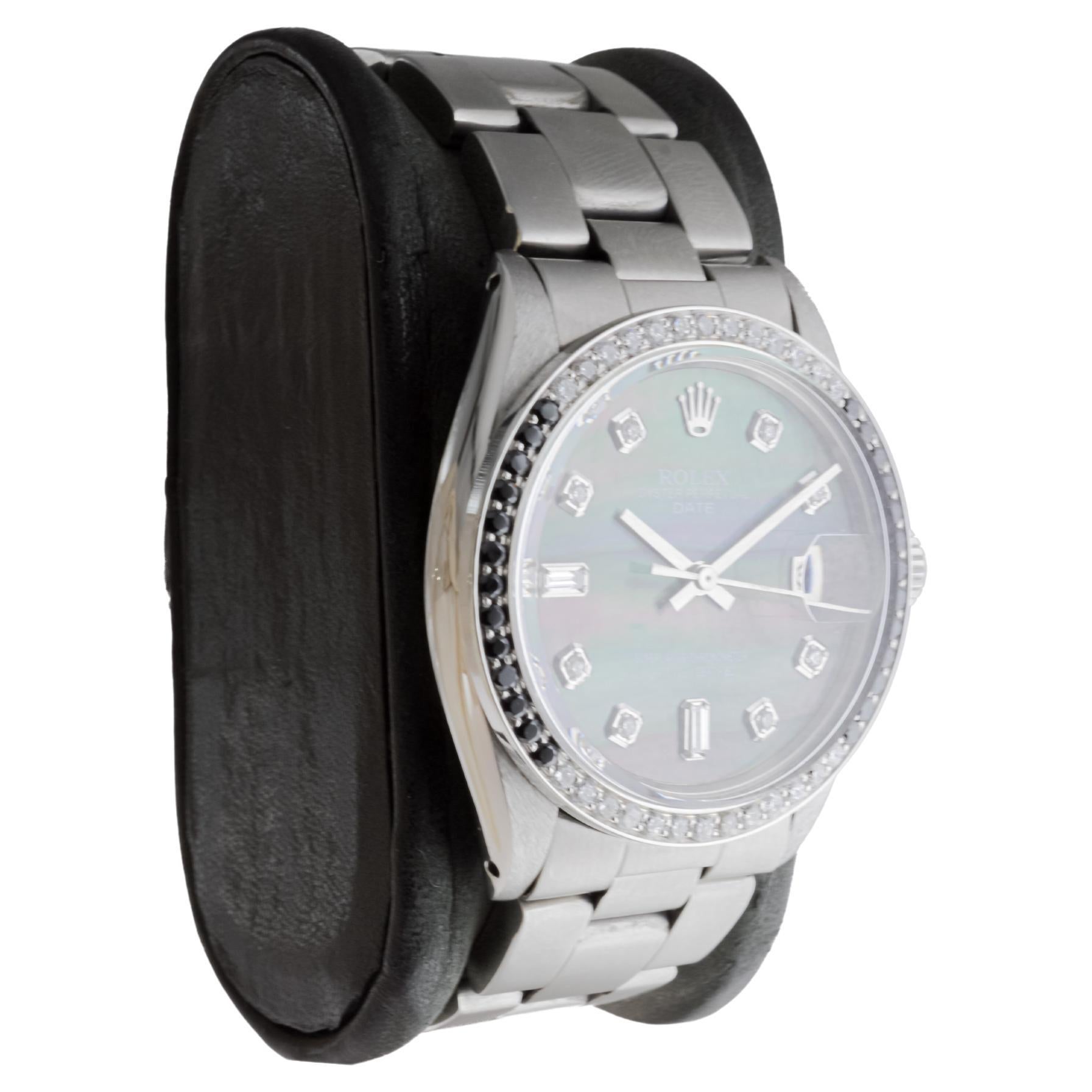 FACTORY / HOUSE: Rolex Watch Company
STYLE / REFERENCE: Oyster Perpetual Date / Reference 1500
METAL / MATERIAL: Stainless Steel with Custom Bezel Black and White Diamonds
CIRCA / YEAR: 1970's
DIMENSIONS / SIZE: Length 41mm X Diameter 35mm
MOVEMENT