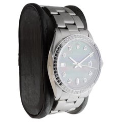 Rolex Steel Oyster Perpetual Date With Custom Mother of Pearl Dial and Bezel