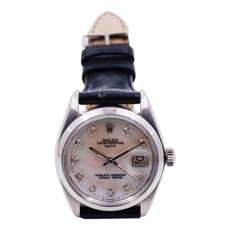 Modern Rolex Steel Oyster Perpetual Date with Custom Mother of Pearl Diamond Dial 1970s For Sale