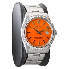 Rolex Steel Oyster Perpetual Date with Custom Orange Dial & Custom Diamond Bezel