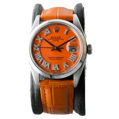 Rolex Steel Oyster Perpetual Date with Custom Orange Dial Diamond Markers 1970's