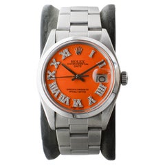 Rolex Steel Oyster Perpetual Date with Custom Orange Dial Diamond Markers 1970's
