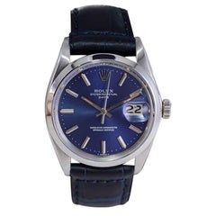 Rolex Steel Oyster Perpetual Date with Flawless Factory Blue Dial 1970
s