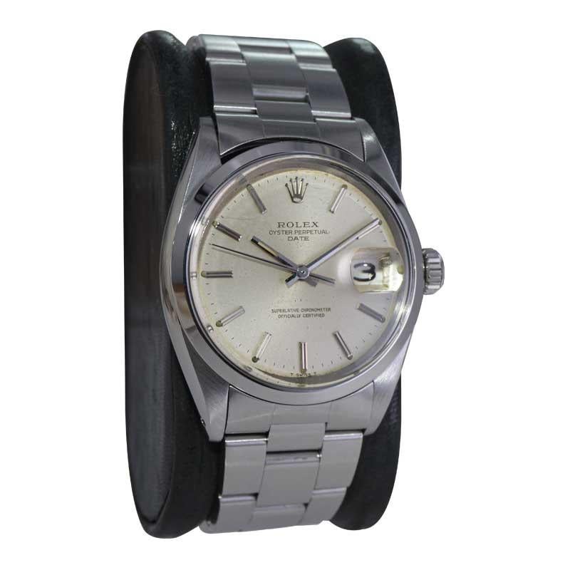 Modernist Rolex Steel Oyster Perpetual Date with Original Silver Dial and Papers 1960's For Sale
