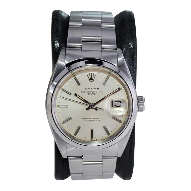 Women's or Men's Rolex Steel Oyster Perpetual Date with Original Silver Dial and Papers 1960's For Sale