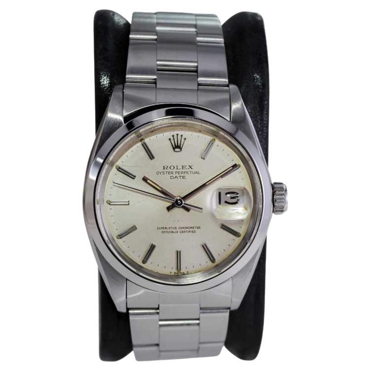 Rolex Steel Oyster Perpetual Date with Original Silver Dial and Papers 1960's For Sale